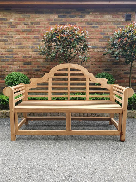 Lutyens teak garden bench, 3 seater 168cm, front view on a patio
